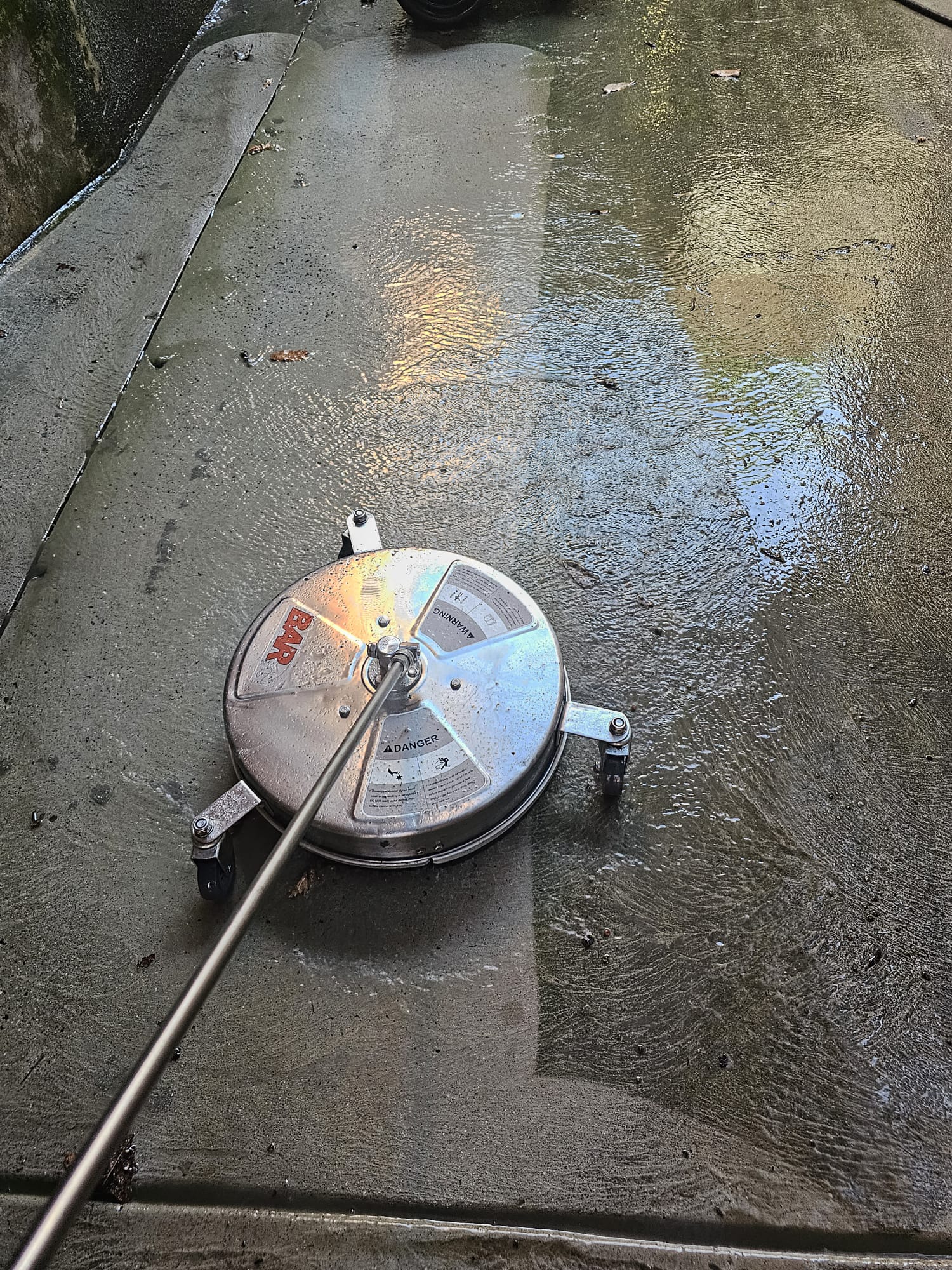 Pressure washing a concrete driveway in Melbourne